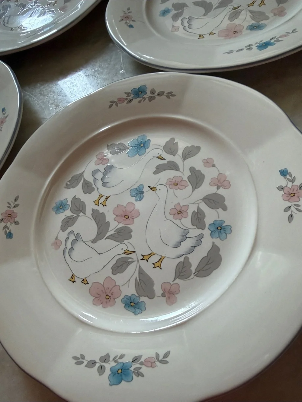 4 COUNTRY CLASSICS Floral Bird  dessert plates Geese- w/ Blue & Pink Accents